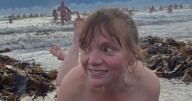 Gogglebox star Kate Bottley strips nude as she joins hundreds for cheeky sea dip