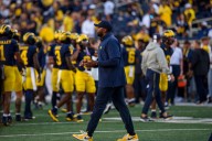 Biff Poggi to serve as interim coach during Sherrone Moore’s 2