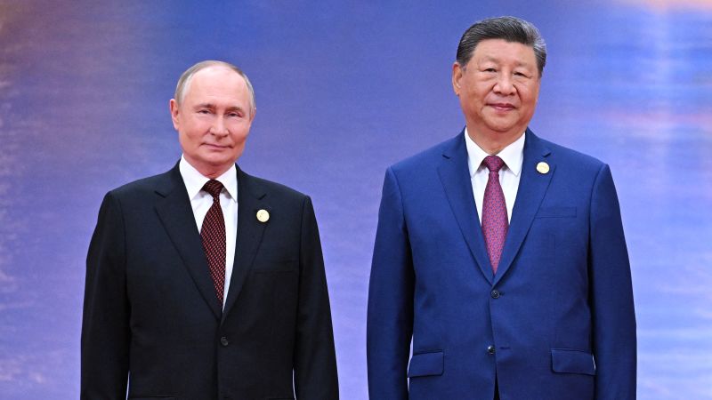 Xi and Putin stand shoulder to shoulder as China casts itself as an alternative global leader