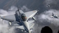 NATO warns Russia to stop 'escalatory' actions