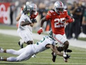 Sayin passes for 3 touchdowns, top-ranked Ohio State pulls away in second half to defeat Ohio 37