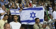 Israel soccer coach 'standing behind my country' amid calls for squad to be suspended