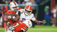 Defense, run game lift No.4 Miami over reeling Gators