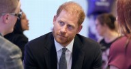 Sad Prince Harry 'yearns for Meghan' on solo UK trip as she plugs merch from home