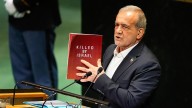 Iran's president blasts US, Israeli attacks for dealing 'grievous blow' to peace as sanctions loom