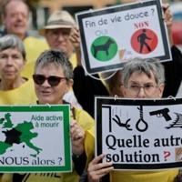 Right-to-die activists on trial in France as lawmakers debate end
