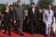 Putin meets North Korea's Kim in Beijing