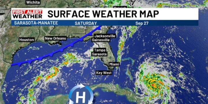 Summer like weather continues as two systems tango in the tropics