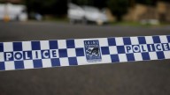 Teen to appear in Parkes Local Court accused of carrying Nazi symbol flag and knife