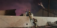 Firefighters defend south Phoenix church after vacant building ignites