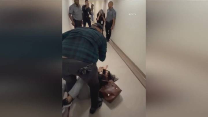 ICE agent ‘relieved of his current duties’ after violently shoving woman to floor