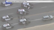LAPD in standoff with naked driver in Brentwood following pursuit