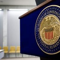 Federal Reserve cuts key rate by quarter-point and signals two more cuts this year