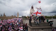 Tens of thousands join far-right rally in London where Charlie Kirk is being mourned