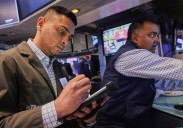 Stocks hold near records as fresh data keeps Fed on track to cut rates