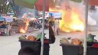 Captan explosión de tanque de gas en pleno parque; visitantes creyeron que nada pasaría aunque el negocio estaba en llamas
