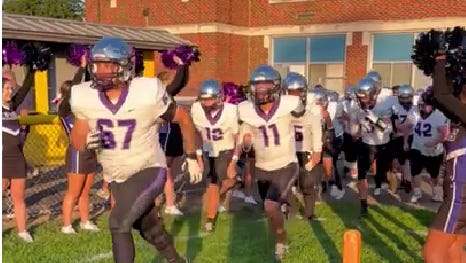 Barberton football players take the field ahead of Week 4 win