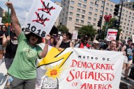 Thousands protest for a 'Free DC' on the fourth week of federal control in Washington