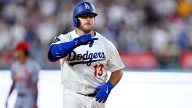 Max Muncy exits Giants game with wrist injury