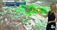 Much cooler Tuesday with rain showers, snow over the mountain passes