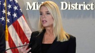 Transgender gun owners in Justice Department sites