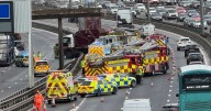 M8 crash as lorry smashes through barrier in Glasgow and person rushed to hospital