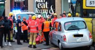 Pictures show taxi and Metrolink crash which sparked rush hour chaos across Manchester