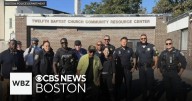 Boston police officers hold walk for peace in Roxbury