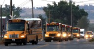 Photo: Busses line up on the first day of school