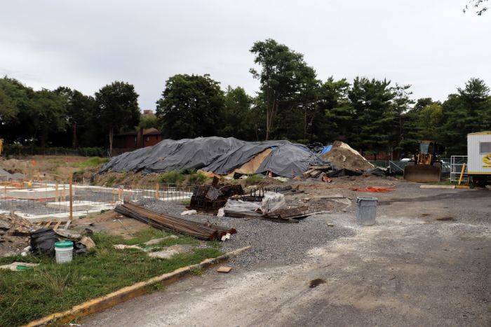 Construction slows as tar oozes up from ground