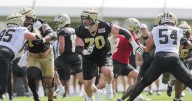 Trevor Penning is 'giddy' to be back on the Saints practice field after turf toe injury