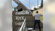 Senator Ted Cruz paints over profane graffiti referencing Charlie Kirk