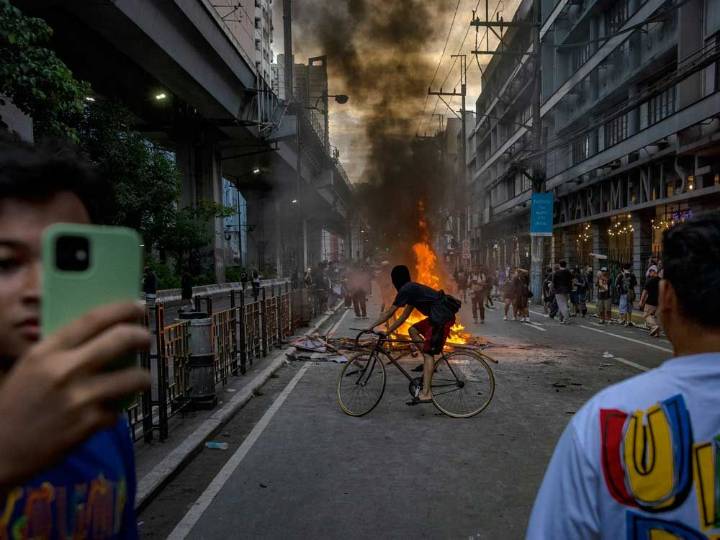 Dozens arrested and hurt in clashes in Manila
