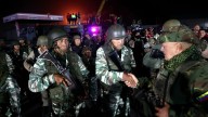 Diosdado Cabello apareció en público vestido de militar y portando un fusil