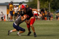 High school football: Huge game by Woolf has South fans howling