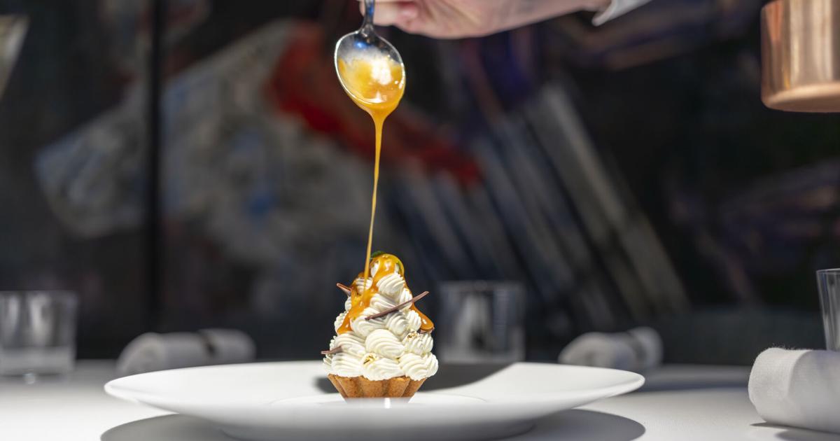 Emeril's tasting menu restaurant is in its own league. Here's what dining is like today.