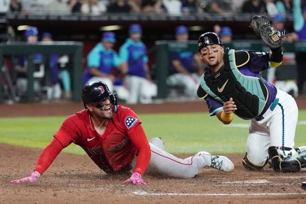 Bookended by pitching implosions, Red Sox drop Diamondbacks series opener