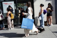 US consumers are feeling the stress of inflation, interest rates, report shows
