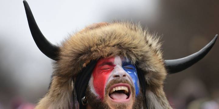 The QAnon Shaman Would Like to Challenge the Validity of Trump's Presidency