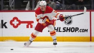 Oilers, Flames split pair of pre