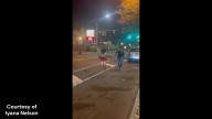 WATCH: Akron officer runs in friendly race with resident