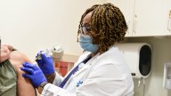 NJ pressures insurers to continue covering COVID vaccines