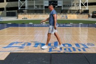 PHOTOS: Preparing the outdoor volleyball court for Tuesday's matches at The Lights