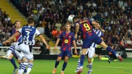 Barcelona go top with 2-1 win over Real Sociedad