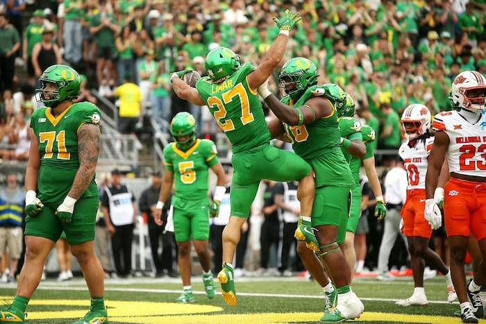 Oregon jumps to No. 4 in AP Top 25 behind Ohio St, Penn St, LSU; Illinois, Florida State into top 10