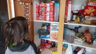 Kid Staring At 47 Varieties Of Cereal Declares There's Nothing To Eat