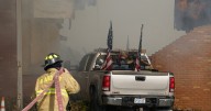 Gunman in truck smashes into Michigan church and opens fire, killing at least four and injuring eight