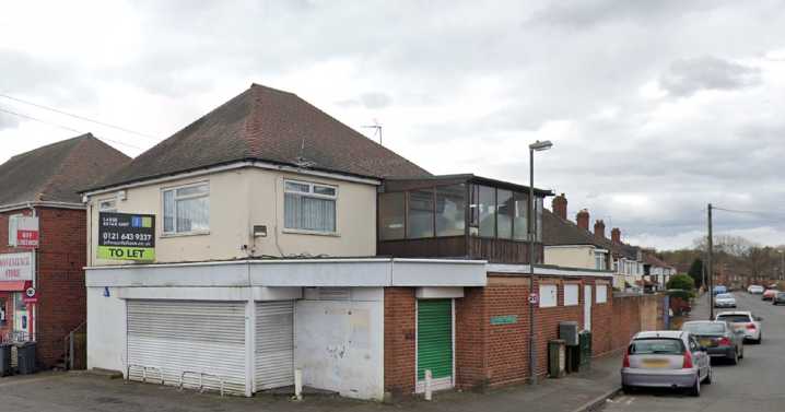 Council rejects move to build flats above shop