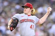 Deadspin | Reds rally past Padres to close gap in wild-card race