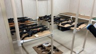 Police say they seized 23 guns from the home of a 13-year-old who appeared to idolize mass shooters